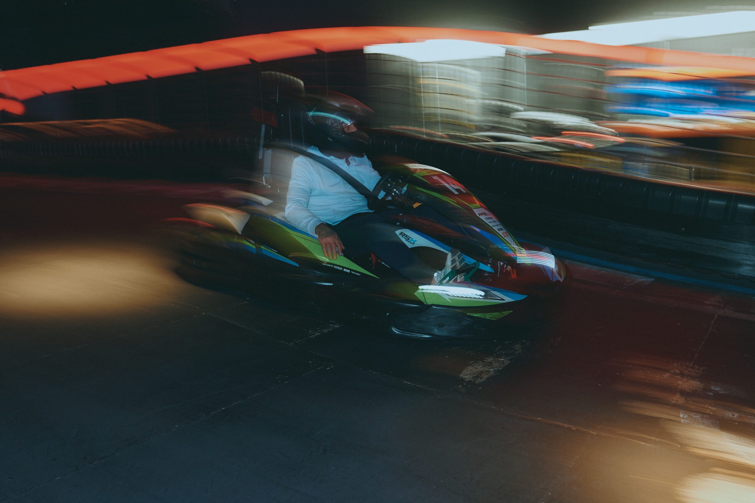 A driver on the unique electric kart track at Level X